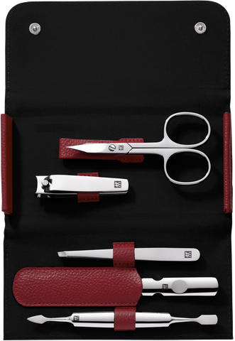 Geöffnetes ZWILLING Classic Set 5tlg. in rot mit den meistgenutzten Pflegeinstrumenten aus rostfreiem Edelstahl.