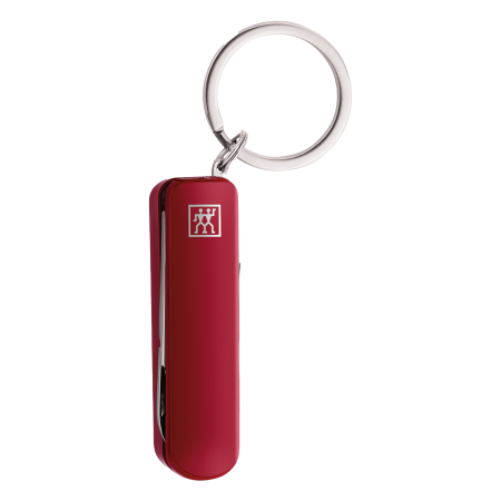Geschlossenes ZWILLING Classic Nagelpflege Multi-Tool in Taschenmesser-Optim mit Nagelknipser, Nagelfeile, Schere und Taschenmesser aus rostfreiem Edelstahl in rot und Schlüsselring.
