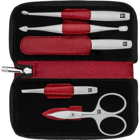 Geöffnetes ZWILLING Premium Maniküre Set 5tlg. in rot mit Reißverschluss und den meistgenutzten Pflegeinstrumenten aus rostfreiem Edelstahl.