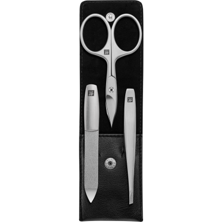 Geöffnetes ZWILLING Premium Set 3tlg. in schwarz mit Druckknopfverschluss und essentiellen Pflegeinstrumenten aus rostfreiem Edelstahl.