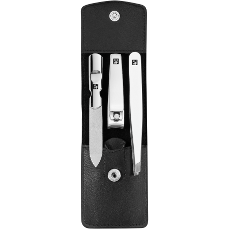 Geöffnetes ZWILLING Classic Set 3tlg. in schwarz mit Druckknopfverschluss mit essentiellen Pflegeinstrumenten aus rostfreiem Edelstahl.