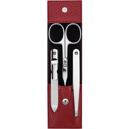 Geöffnetes ZWILLING Classic Set 3tlg. in rot mit Druckknopfverschluss und  essentiellen Pflegeinstrumenten aus rostfreiem Edelstahl.