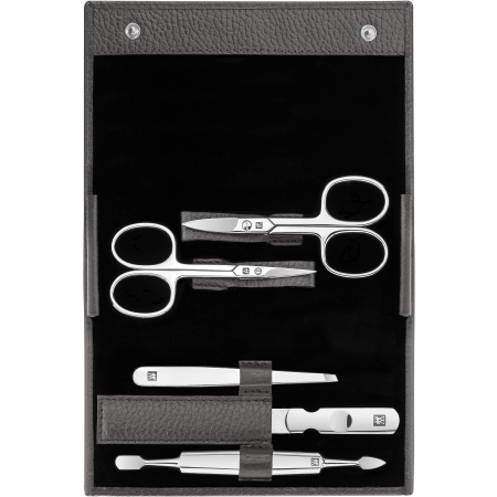 Geöffnetes ZWILLING Classic Set 5tlg. in anthrazit mit Druckknopfverschluss und den meistgenutzten Pflegeinstrumenten aus rostfreiem Edelstahl.