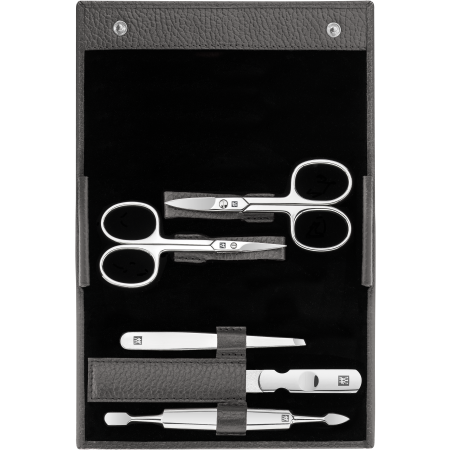 Geöffnetes ZWILLING Classic Set 5tlg. in anthrazit mit Druckknopfverschluss und den meistgenutzten Pflegeinstrumenten aus rostfreiem Edelstahl.