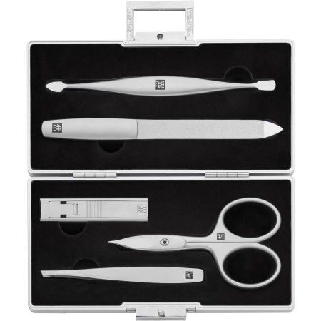 Geöffnetes ZWILLING Premium Set 5tlg. in silbernem Aluminiumkoffer und den meistgenutzten Pflegeinstrumenten.