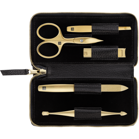Geöffnetes ZWILLING Premium Set 5tlg. in Schwarz mit Reißverschluss und den meistgenutzten Pflegeinstrumenten in gold.