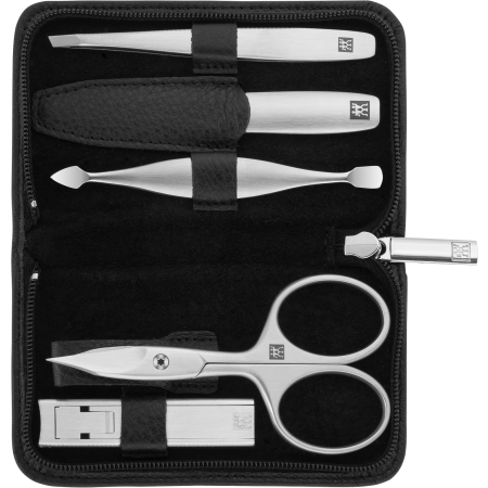 Geöffnetes ZWILLING Premium Set 5tlg. in schwarz mit Reißverschluss und den meistgenutzten Pflegeinstrumenten aus rostfreiem Edelstahl.