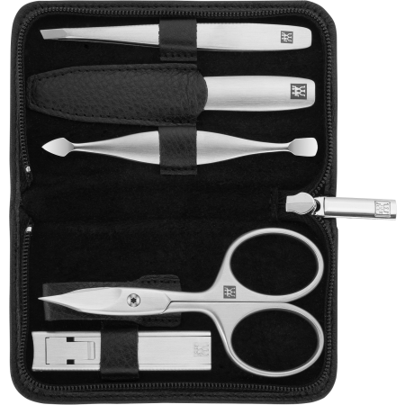 Geöffnetes ZWILLING Premium Set 5tlg. in schwarz mit Reißverschluss und den meistgenutzten Pflegeinstrumenten aus rostfreiem Edelstahl.