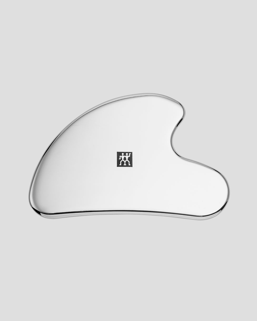Gesichtsmassager von ZWILLING Beauty vor grauem Hintergrund.