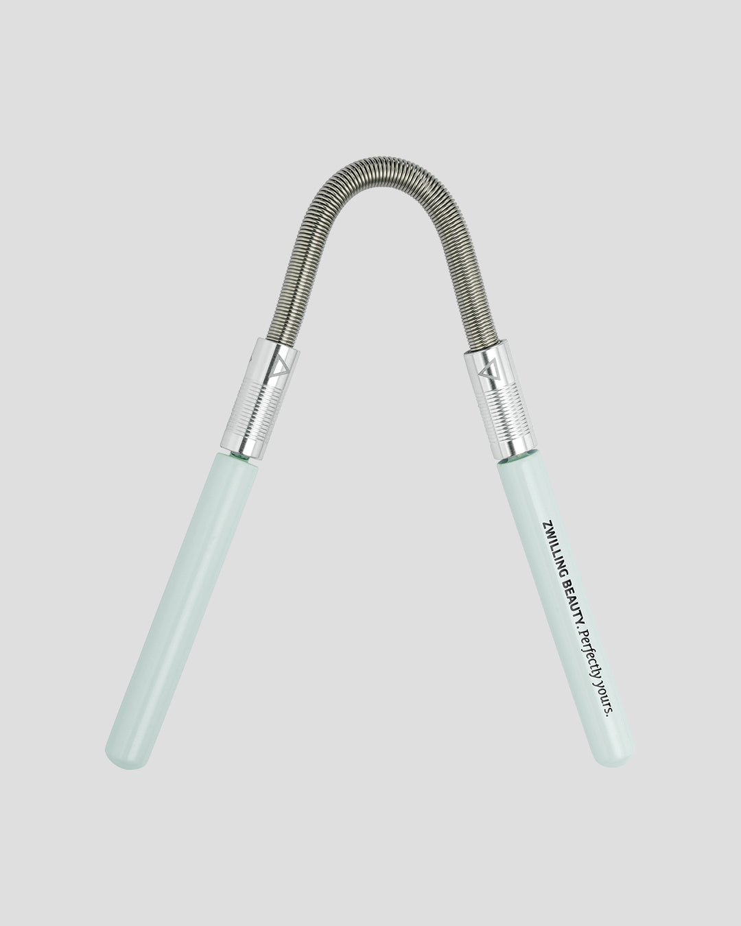 Gesichtshaarentferner mit türkisen Details von ZWILLING Beauty vor grauem Hintergrund.