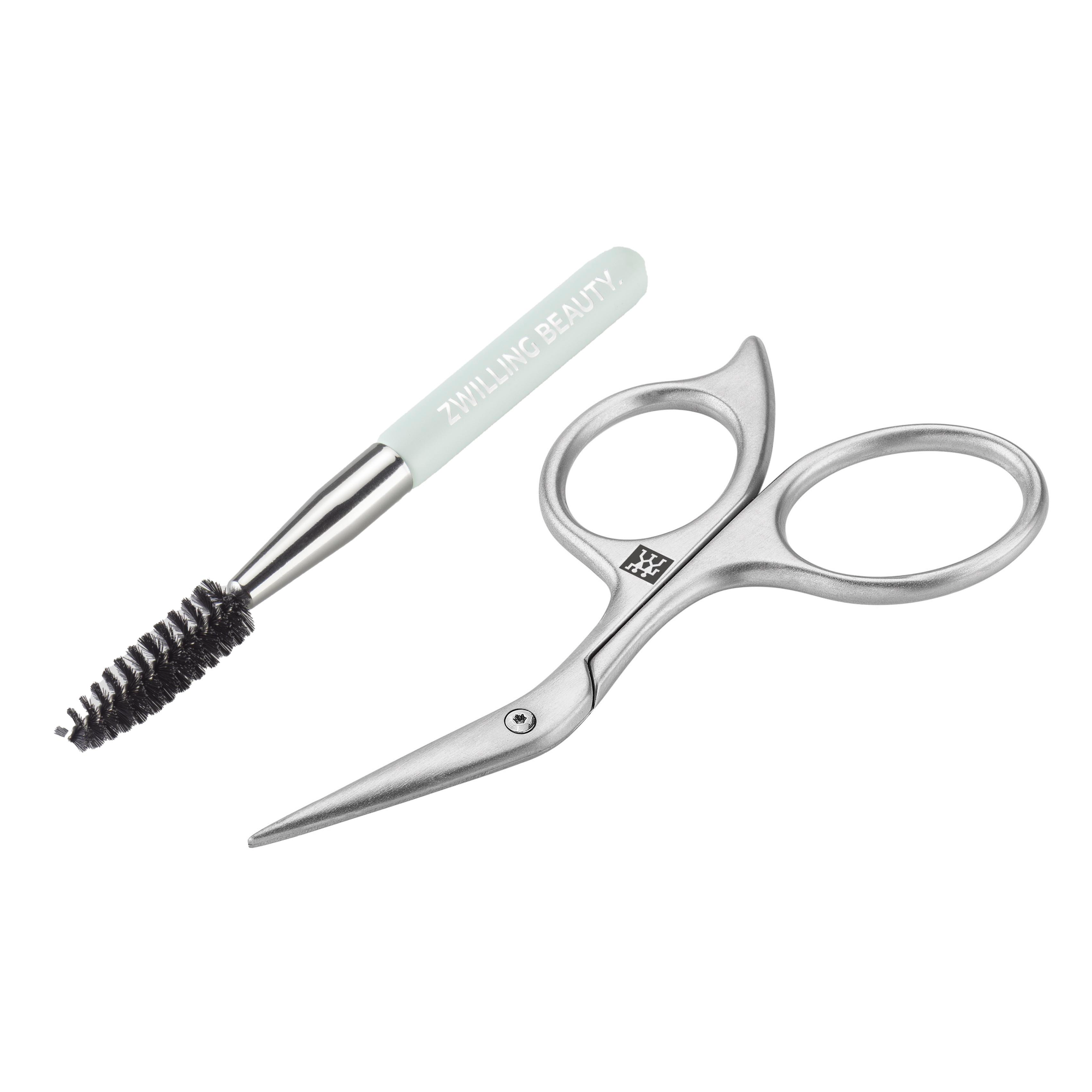 Queransicht einer ZWILLING Premium Augenbrauenschere aus rostfreiem Edelstahl mit abgewinkelter, hauchdünner Schneide  inklusive Augenbrauenbürste.
