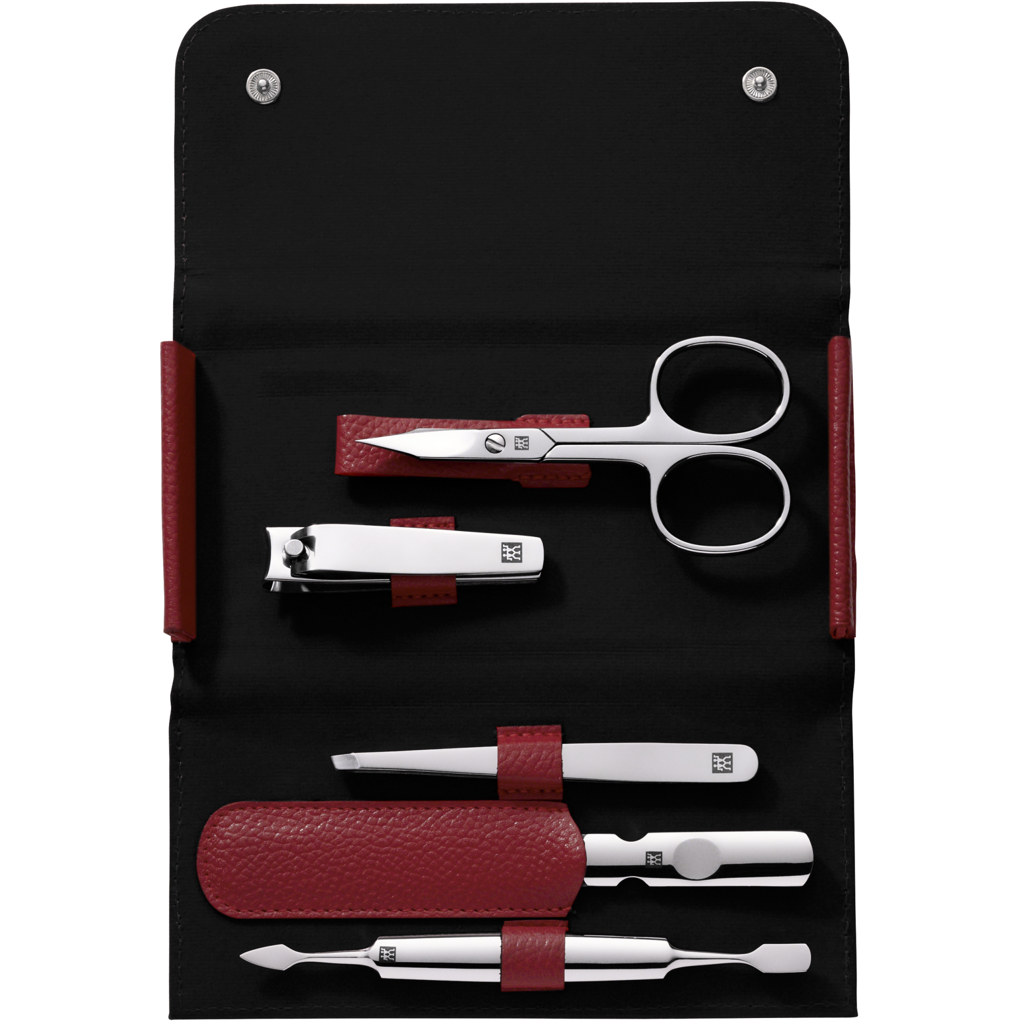 Geöffnetes ZWILLING Classic Set 5tlg. in rot mit Druckknopfverschluss und den meistgenutzten Pflegeinstrumenten aus rostfreiem Edelstahl.