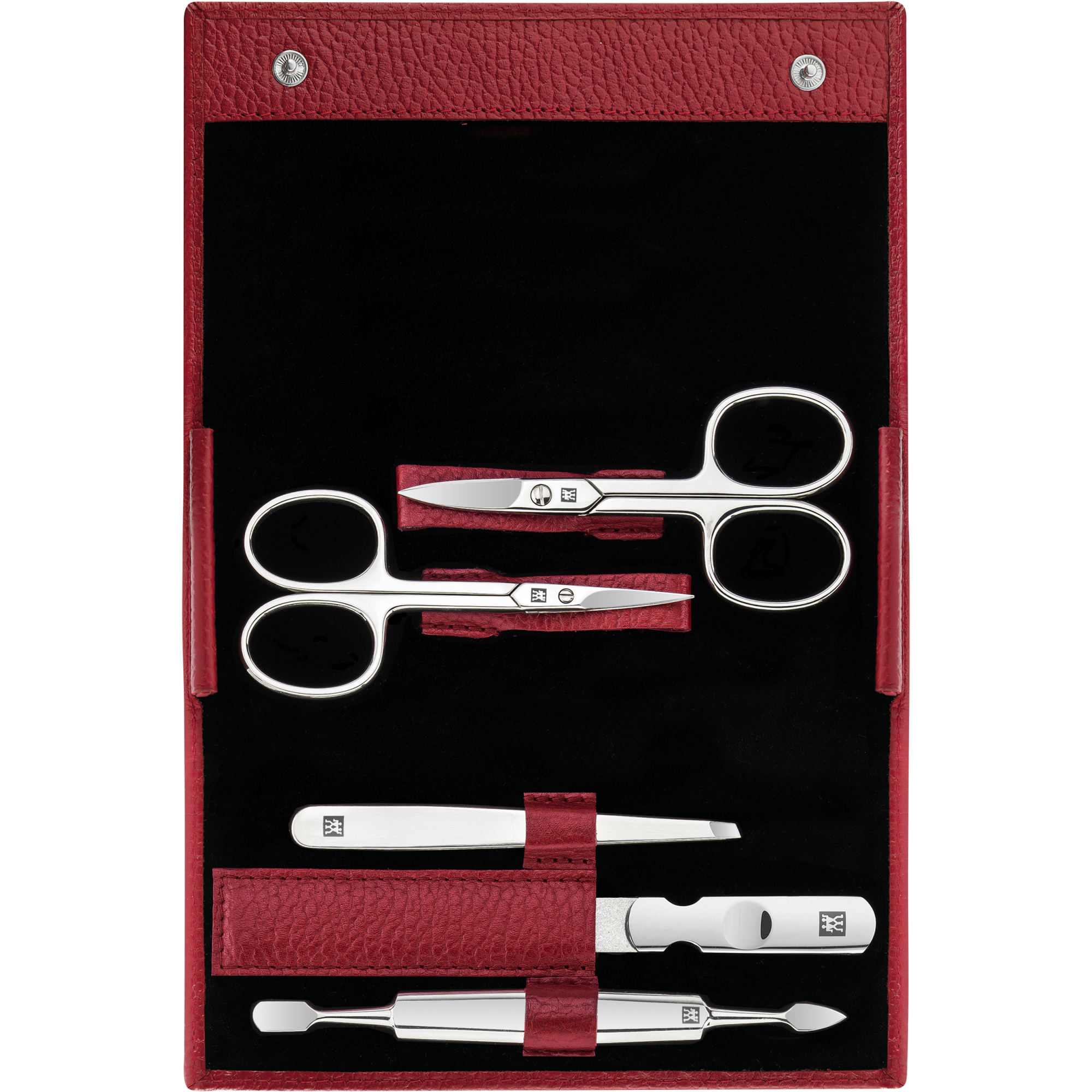 Geöffnetes ZWILLING Classic Set 5tlg. in rot mit Druckknopfverschluss und den meistgenutzten Pflegeinstrumenten aus rostfreiem Edelstahl.