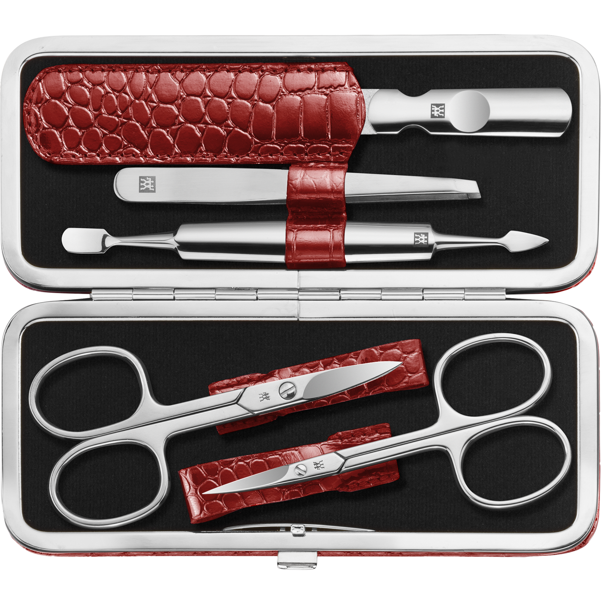 Geöffnetes ZWILLING Classic Set 5tlg. in roter Kroko-Optik mit Metallrahmen und den meistgenutzten Pflegeinstrumenten aus rostfreiem Edelstahl.