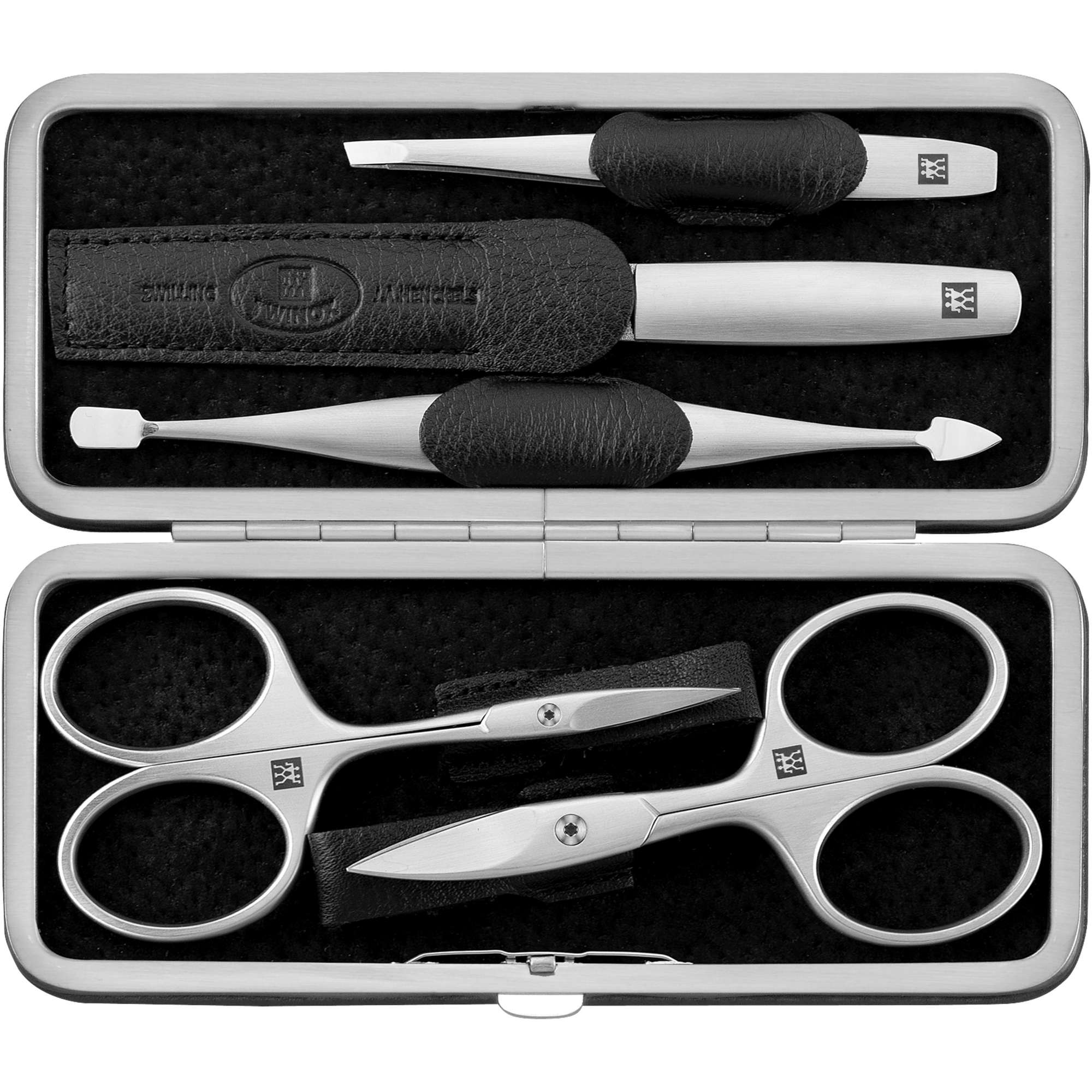 Geöffnetes ZWILLING Premium Set 5tlg. in schwarz mit Metallrahmen, mit den meistgenutzten Pflegeinstrumenten aus rostfreiem Edelstahl.