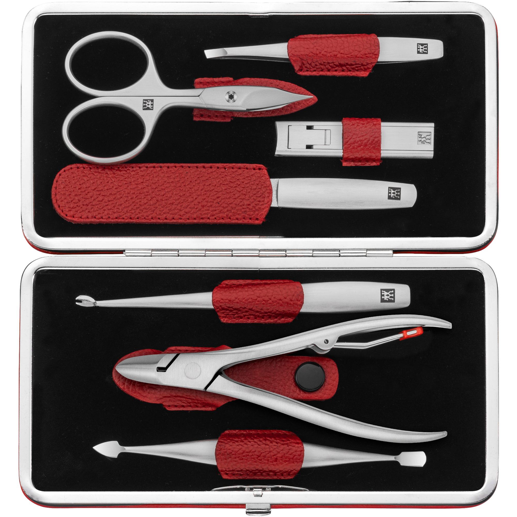 Geöffnetes ZWILLING Premium Set 7tlg. in rot mit Metallrahmen, mit den meistgenutzten Pflegeinstrumenten aus rostfreiem Edelstahl.