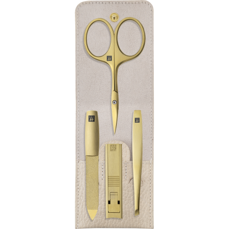 Geöffnetes ZWILLING Premium Set 4tlg. in Beige mit Druckknopfverschluss und den meistgenutzten Pflegeinstrumenten in gold.