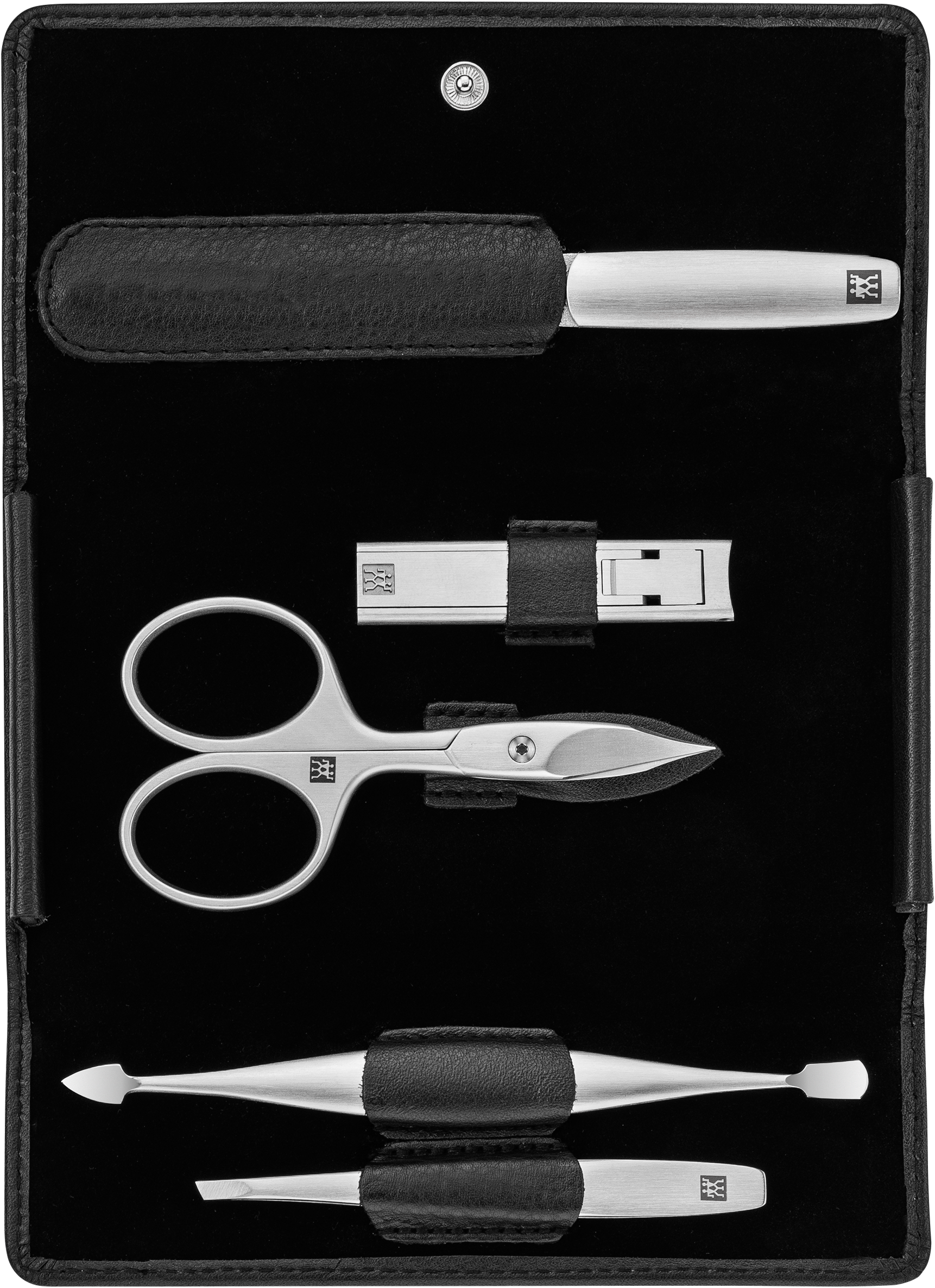 Geöffnetes ZWILLING Premium Set 5tlg. in schwarz mit den meistgenutzten Pflegeinstrumenten aus rostfreiem Edelstahl.