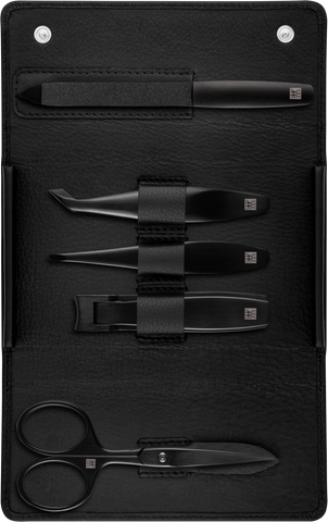 Geöffnetes ZWILLING Premium Set 5tlg. in schwarz mit den meistgenutzten Pflegeinstrumenten in matt-schwarz.