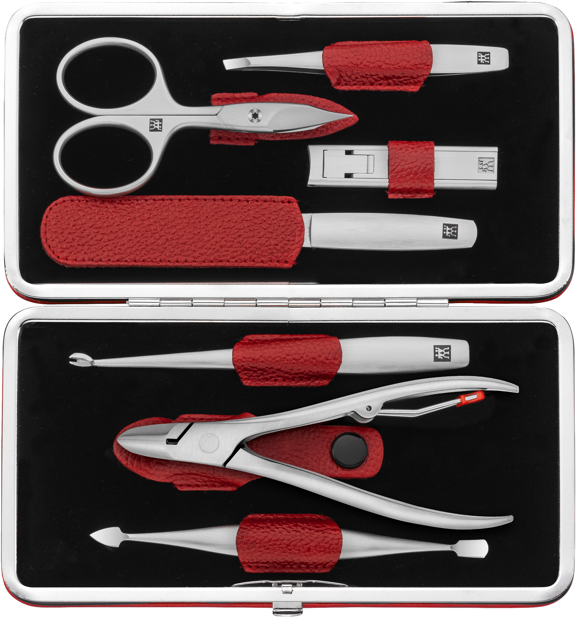 Geöffnetes ZWILLING Premium Set 7tlg. in rot mit Metallrahmen, mit den meistgenutzten Pflegeinstrumenten aus rostfreiem Edelstahl.