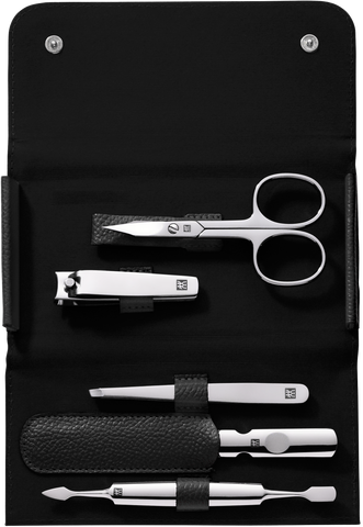 Geöffnetes ZWILLING Classic Set 5tlg. in schwarz mit den meistgenutzten Pflegeinstrumenten aus rostfreiem Edelstahl.