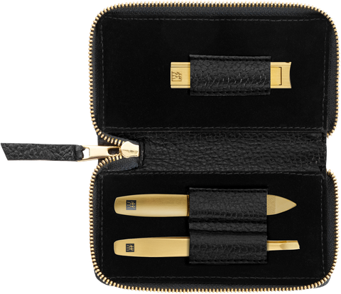 Geöffnetes ZWILLING Premium Set 3tlg. in schwarz mit essentiellen Pflegeinstrumenten in gold.