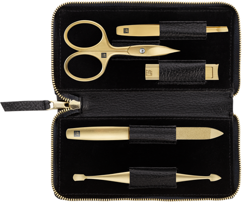 Geöffnetes ZWILLING Premium Set 5tlg. in schwarz mit den meistgenutzten Pflegeinstrumenten in gold.