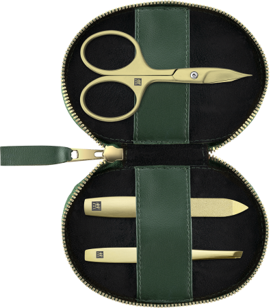 Geöffnetes ZWILLING Premium Apfelleder Set 3tlg. in grün mit essentiellen Pflegeinstrumenten (Nagel- und Hautschere, Saphir-Nagelfeile und schräge Pinzette) in matt-gold.