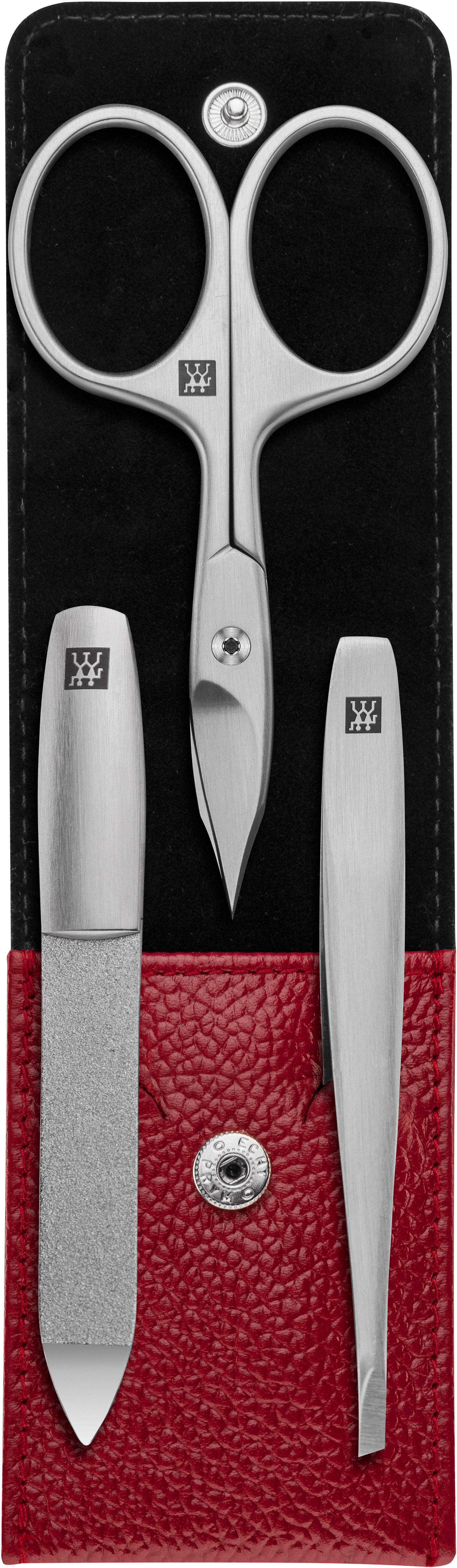 Geöffnetes ZWILLING Premium Maniküre Set 3tlg. in rot mit essentiellen Pflegeinstrumenten aus rostfreiem Edelstahl.