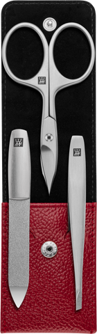 Geöffnetes ZWILLING Premium Maniküre Set 3tlg. in rot mit essentiellen Pflegeinstrumenten aus rostfreiem Edelstahl.