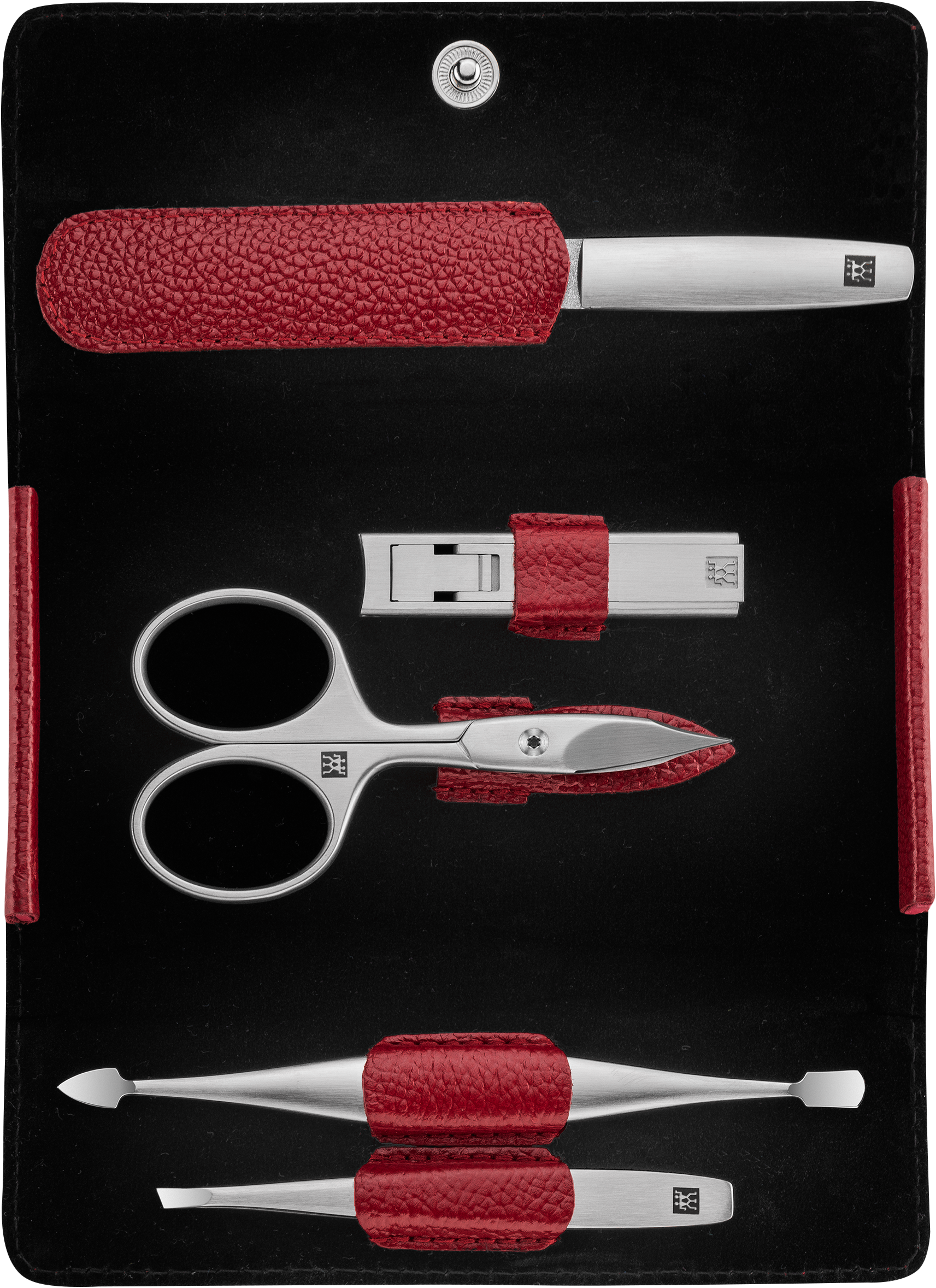 Geöffnetes ZWILLING Premium Maniküre Set 5tlg. in rot mit den meistgenutzten Pflegeinstrumenten aus rostfreiem Edelstahl.