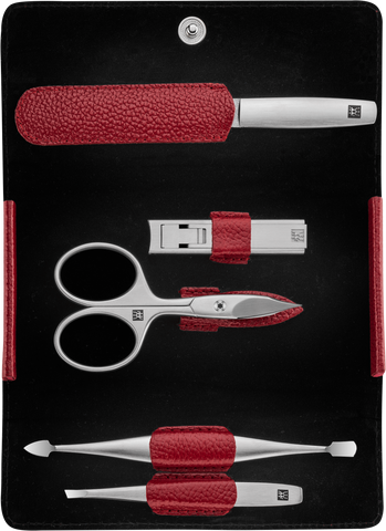 Geöffnetes ZWILLING Premium Maniküre Set 5tlg. in rot mit den meistgenutzten Pflegeinstrumenten aus rostfreiem Edelstahl.