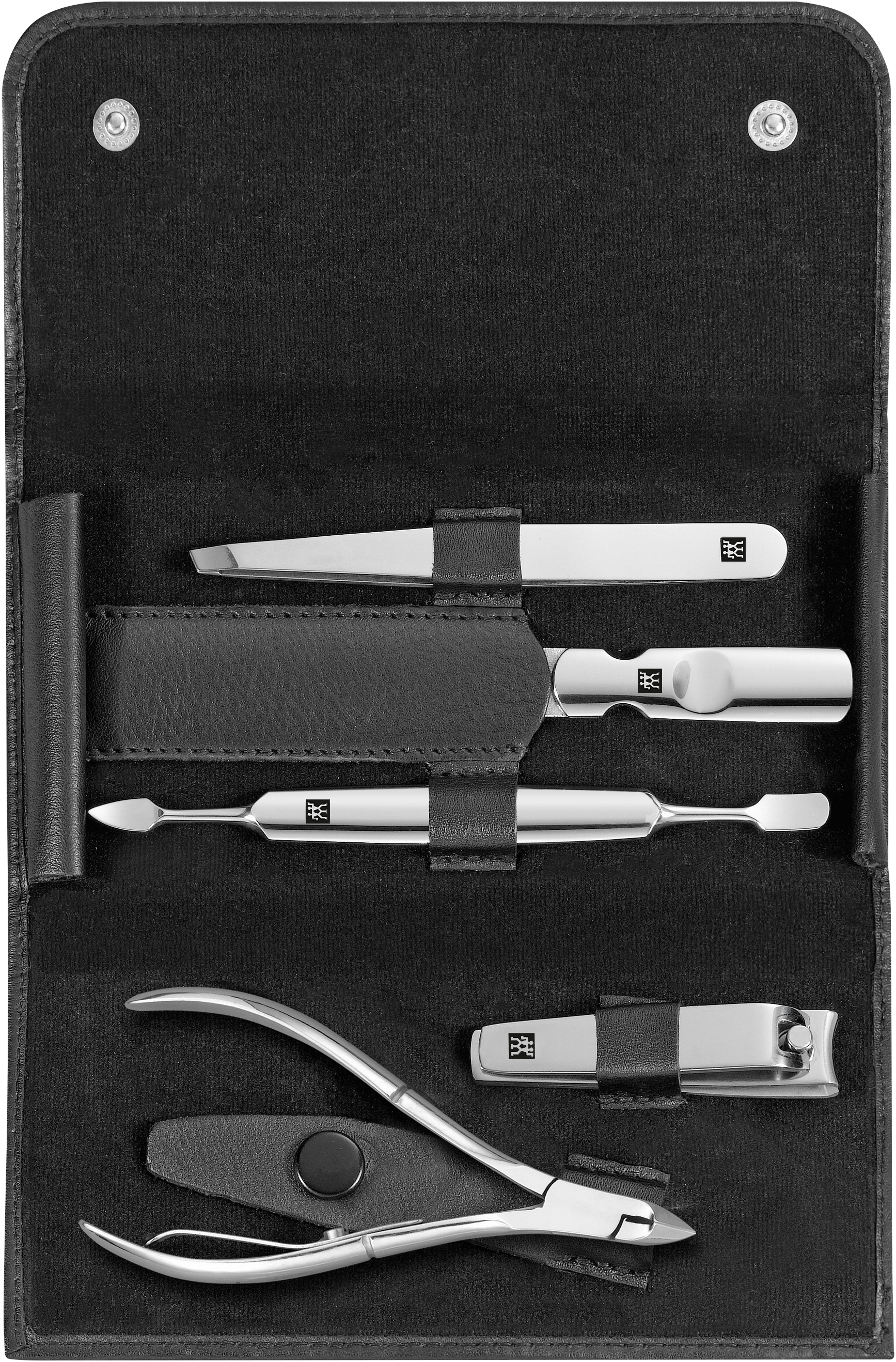 Geöffnetes ZWILLING Classic Set 5tlg. in schwarz mit den meistgenutzten Pflegeinstrumenten aus rostfreiem Edelstahl.