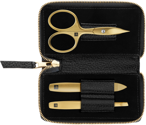Geöffnetes ZWILLING Premium Set 3tlg. in schwarz mit essentiellen Pflegeinstrumenten in gold.