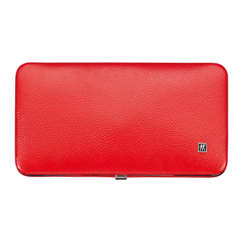 Frontalansicht eines geschlossenen ZWILLING Premium Sets 7tlg. in rot mit den meistgenutzten Pflegeinstrumenten aus rostfreiem Edelstahl.