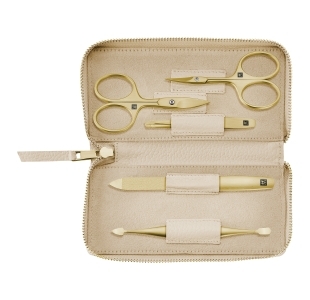 Geöffnetes ZWILLING Premium Set 5tlg. in beige mit den meistgenutzten Pflegeinstrumenten in gold.