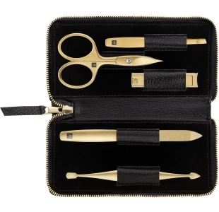 Geöffnetes ZWILLING Premium Set 5tlg. in schwarz mit den meistgenutzten Pflegeinstrumenten in gold.