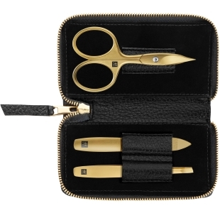 Geöffnetes ZWILLING Premium Set 3tlg. in schwarz mit essentiellen Pflegeinstrumenten in gold.